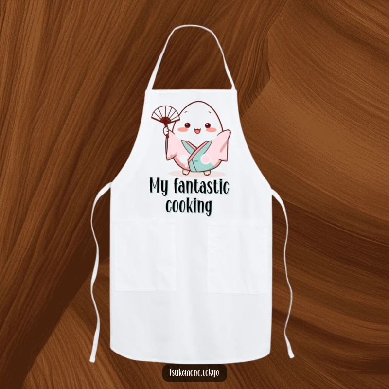 Funny apron showcasing a plump onigiri character in a small kimono cheerfully waving a tiny fan.