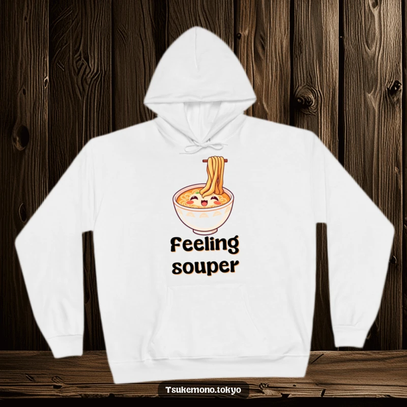 Funny ramen hoodie showing a happy bowl with noodles looking up in delight, a cozy and humorous gift for foodies.