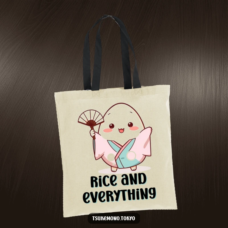 Funny tote bag with a plump onigiri character in a small kimono cheerfully waving a tiny fan.